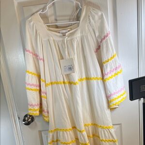 Charming White Dress with Pink and Yellow Accents